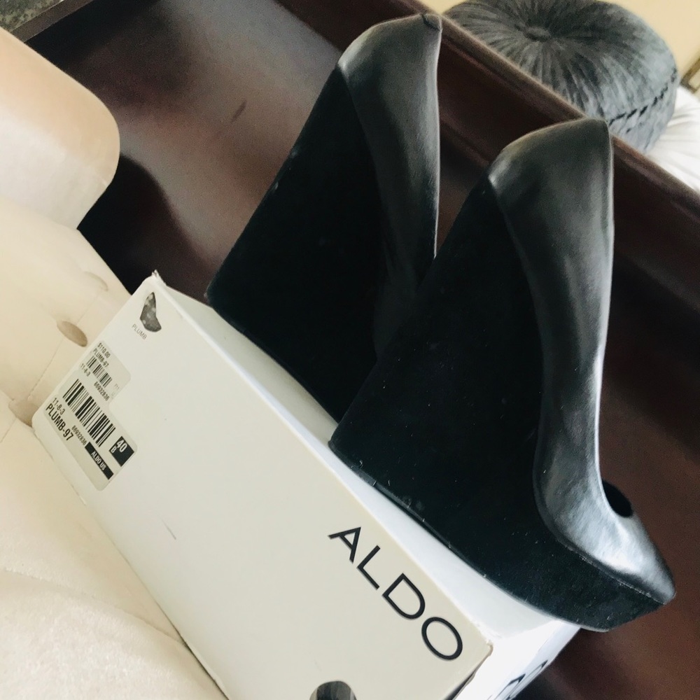 ALDO wedged pumps.